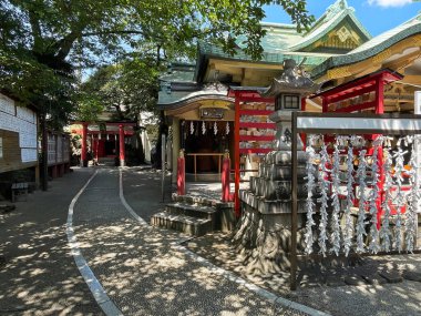 Traditional Temples and Modern Residences in Shinjuku, Tokyo, Japan clipart
