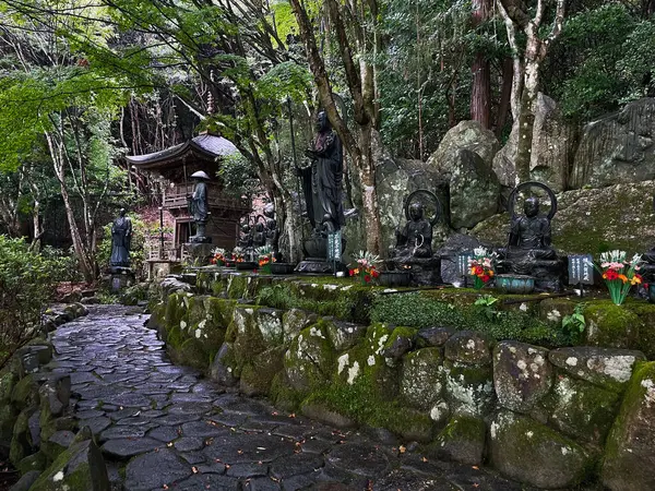 stock image Sacred Beauty: Stone Statue Guardians in Miyajima Temple, Hiroshima, Japan