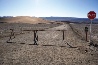 Unaccessible roads in the emptiness at Valley of the Moon, San Pedro De Atacama, Chile clipart