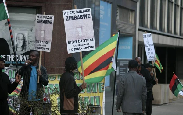 stock image Zimbabwe Will Never Be A Colony Again Protest at UN-NYC. October 24, 2022, New York, USA: Few Zimbabweans and others protest in front of UN in New York Zimbabwe Will Never Be A Colony Again 