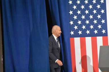 Biden and Kamala Harris deliver remarks during a rally. November 10, 2022, Washington: USA: President of the United States Joe Biden and Vice President Kamala Harris deliver remarks during a rally following Election Day clipart