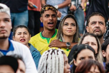 FIFA Dünya Kupası Katarı 2022: Taraftarlar Guarulhos 'ta Maia Fan Festa' da Brezilya ve Sırbistan 'ı izliyorlar. 14 Kasım 2022 'de, Guarulhos, Sao Paulo, Brezilya: Bosque Maia Park Sao Paulo' da, Brezilya 'nın maçını yayınlayan Maia Fan Party' ye ev sahipliği yaptı. 