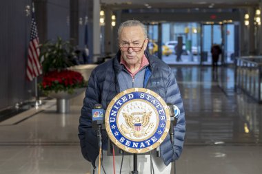 Senator Schumer Calls On Health and Human Services To Help Combat The Rise In RSV Cases. December 04, 2022, New York, New York, USA: Senate Majority Leader, U.S. Senator Chuck Schumer (D-NY) holding an Instagram picture of Samantha Augeri clipart