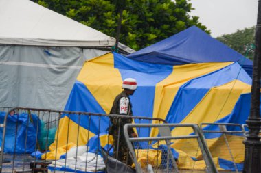 Invasion of Brazilian Three Powers in Brasilia by Bolsonaro Supporters. January 09, 2023, Brasilia, Federal District, Brazil: Bolsonaros supporters vacated the camp set up in front of the East Military Barrack (CML) clipart