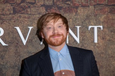 Apple TV+ Servant Season 4 New York Premiere. January 09, 2023, New York, New York, USA: Rupert Grint attends the Apple TV+ Servant Season 4 New York Premiere at Walter Reade Theater on January 09, 2023 clipart