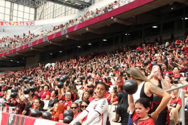 Mostly women and children watch Paranaense Soccer Championship. January 21, 2023, Curitiba, Parana, Brazil: In addition to the ticket to enter the Athletico Paranaense game against Maringa on Saturday (21)