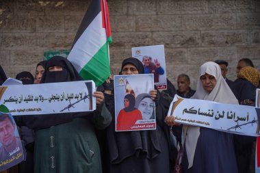 (INT) The women's movement in the Hamas movement organizes a mass rally, January 23, 2022. Gaza, Palestine: The women's movement in the Hamas movement organized a mass stand in solidarity with the male and female prisoners in the occupation prisons 