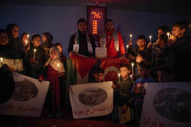 The children of Gaza stand in solidarity with the Turkish people and the Syrian people. February 11, 2023, Gaza, Palestine: The children of Gaza show solidarity with the Syrian people and the Turkish people, express their grief 