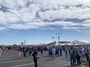 Chiefs and Kansas fight it out for Super Bowl LVII in Arizona. February 12, 2023, Glendale, Arizona, USA: Fans and lovers of American football heading for the stadium to watch the Kansas City Chiefs play against Philadelphia Eagles