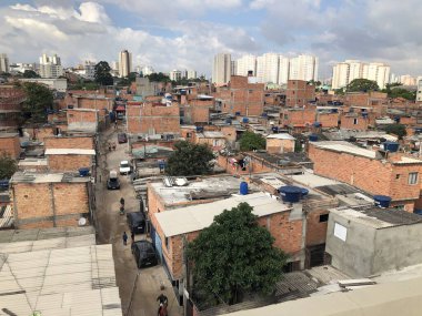 Sao Paulo 'daki Favelas' ta yangın. 27 Nisan 2023. Sao Paulo, Brezilya: Sao Paulo (SP), 04 / 27 / 2023 Perşembe günü erken saatlerde Sao Paulo 'nun doğu bölgesindeki Pau Queimado gecekondularında meydana gelen büyük bir yangın onlarca ahşap barakayı tahrip etti..