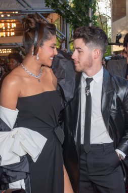 The Pierre Hotel: 2023 Met Gala Departures. May 01, 2023, New York, New York, USA: Priyanka Chopra wearing Valentino and Nick Jonas departs The Pierre Hotel for 2023 Met Gala on May 01, 2023 in New York City.  clipart