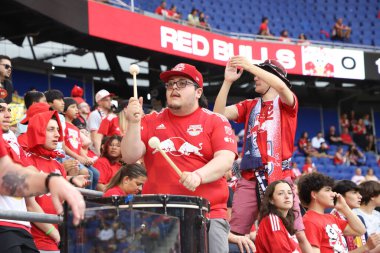 MLS match between Red Bulls vs New York City FC. May 13, 2023. New Jersey, USA: Crowded movement of fans before the soccer match between Red Bulls and New York City FC, in the MLS American Football League, at Red Bull Arena in Harrison clipart