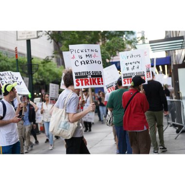 Writers Guild of America on strike in New York City. May 15, 2023 ,New York , USA: The Writers Guild of America (WGA) went on strike today near the Manhattan Center where the Fox upfront 2023 is being held. clipart