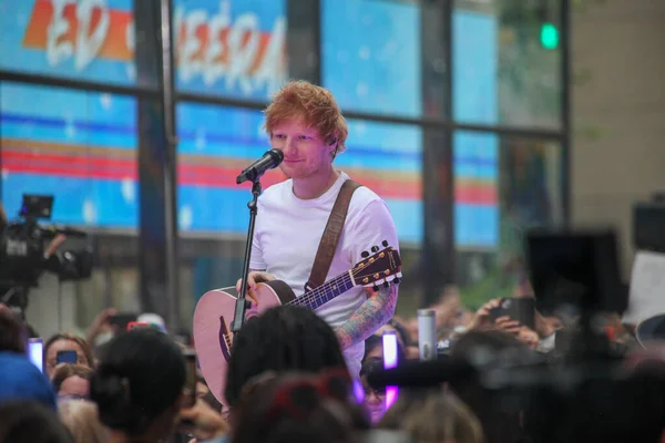 stock image Ed Sheeran Performs live on Today Show. June 6, 2023, New York, USA: Ed Sheeran performs at the Citi Concert Series live on TODAY Plaza in Rockefeller center with the presence of fans screaming and singing all their songs. 