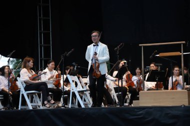 Parktaki New York Filarmoni Konserleri. 14 Haziran 2023, New York, ABD: New York Filarmoni Orkestrası da dahil olmak üzere birçok kişinin katılımıyla New York 'taki Central Park Great Lawn' da düzenlenen Parklardaki konserler.