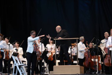 Parktaki New York Filarmoni Konserleri. 14 Haziran 2023, New York, ABD: New York Filarmoni Orkestrası da dahil olmak üzere birçok kişinin katılımıyla New York 'taki Central Park Great Lawn' da düzenlenen Parklardaki konserler.