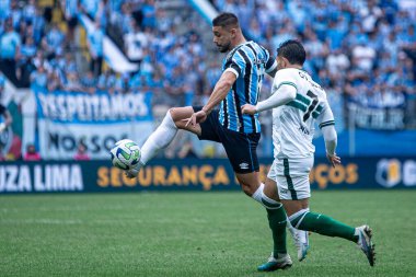 PORTO ALEGRE (RS), Brezilya 06 / 25 / 2023 - Gremio ve Coritiba arasındaki maç, Brasileirao 'nun 12.' si için geçerli, Porto Alegre 'nin kuzey bölgesindeki Arena do Gremio' da, bu pazar öğleden sonra, 25 Haziran 2023. 