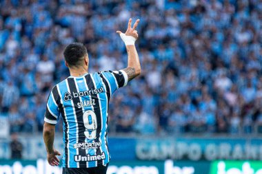 PORTO ALEGRE (RS), Brezilya 06 / 25 / 2023 - Suarez, Brasileirao Arena do Gremio 'da yapılan Coritiba maçında Gremio' nun gömleğiyle bir gol daha attı ve bunu kutladı. 