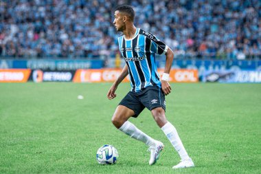 PORTO ALEGRE (RS), Brezilya 06 / 25 / 2023 - Andre, Arena do Gremio 'da yapılan Coritiba maçında Gremio' nun gömleğiyle ilk golünü atıyor ve ilk golünü Coritiba ile kutluyor.