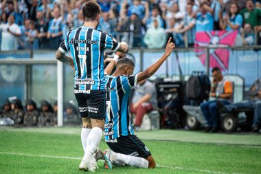 PORTO ALEGRE (RS), Brezilya 06 / 25 / 2023 - Andre, Arena do Gremio 'da yapılan Coritiba maçında Gremio' nun gömleğiyle ilk golünü atıyor ve ilk golünü Coritiba ile kutluyor.