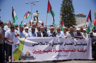 (INT) Ulusal ve İslami Eylem Fraksiyonları Jenin kampı için bir destek standı organize ediyor. 3 Temmuz 2023, Gazze, Filistin: Ulusal ve İslami Eylem Fraksiyonları Pazartesi günü Jenin kampı için bir destek standı düzenledi. 