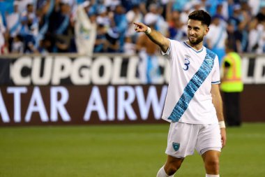 (Guatemala Oyuncuları, Concacaf Altın Kupasında Guadeloupe 'a karşı kazandıkları zaferi kutluyorlar. 4 Temmuz 2023, Harison, New Jersey, ABD: Guadeloupe ve Guatemala arasındaki futbol maçı Red Bull Arena 'da oynanan Concacaf Gold Cup' ın 3. turu için geçerli