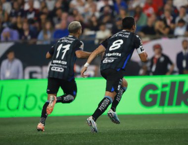 Lig Kupası: Queretaro, New England 'a karşı. 07 Ağustos 2023, Boston, Massachusetts, ABD: Jaime Gomez Valencia (Queretaro), Queretaro ve New England arasındaki futbol maçı sırasında takım oyuncularıyla yaptığı golü kutlar.