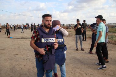 September 13, 2023 - Gaza, Palestine: Palestinians participate in confrontations on the border strip of Gaza City with the occupation, and the confrontations resulted in a number of injuries, including journalists. clipart