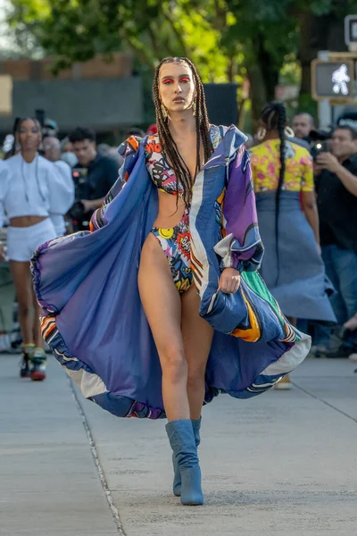 stock image September 16, 2023 - New York, USA: A model walks the runway at the Edwing; Angelo fashion show on a Harlem Street during New York Fashion Week September 2023. 