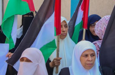 Filistinli mezunlar Birleşmiş Milletler Teşkilatı 'nda bir iş talep etme arayışına katıldılar. 19 Eylül 2023, Gazze, Filistin: Filistinli mezunlar Birleşmiş Milletler Yardım ve Mülteci Dairesi UNR 'de bir iş arama arayışına katıldılar