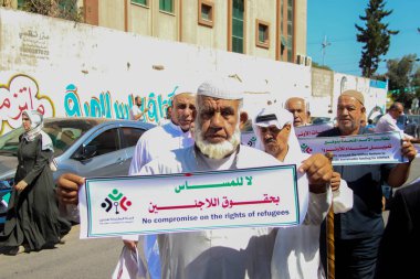 Mülteciler için Ortak Komite 'nin Gazze' deki basın toplantısı. 21 Eylül 2023, Gazze, Filistin: Filistinliler Birleşmiş Milletler Yardım ve İş Ajansı önünde düzenlenen Mülteciler Ortak Komitesi basın toplantısına katıldılar