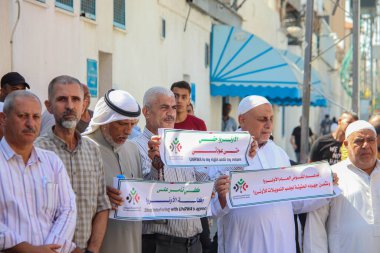 Mülteciler için Ortak Komite 'nin Gazze' deki basın toplantısı. 21 Eylül 2023, Gazze, Filistin: Filistinliler Birleşmiş Milletler Yardım ve İş Ajansı önünde düzenlenen Mülteciler Ortak Komitesi basın toplantısına katıldılar