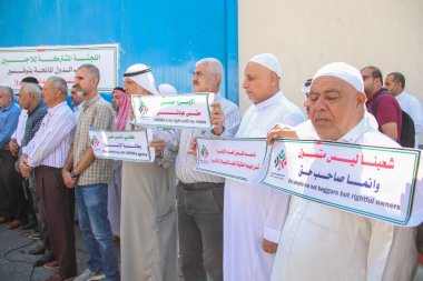 Mülteciler için Ortak Komite 'nin Gazze' deki basın toplantısı. 21 Eylül 2023, Gazze, Filistin: Filistinliler Birleşmiş Milletler Yardım ve İş Ajansı önünde düzenlenen Mülteciler Ortak Komitesi basın toplantısına katıldılar