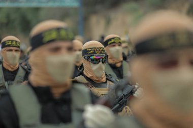 4 Ekim 2023 - Gazze, Filistin: Filistin 'deki İslami Cihat Hareketi' nin askeri kanadı El Kaide Tugayları 'ndan savaşçılar, Gazze Şeridi' ndeki 36..