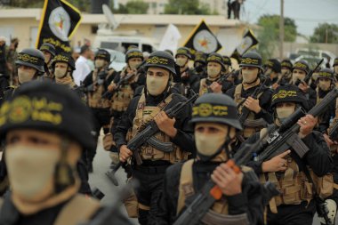 4 Ekim 2023 - Gazze, Filistin: Filistin 'deki İslami Cihat Hareketi' nin askeri kanadı El Kaide Tugayları 'ndan savaşçılar, Gazze Şeridi' ndeki 36..