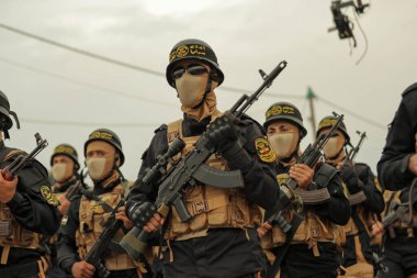 4 Ekim 2023 - Gazze, Filistin: Filistin 'deki İslami Cihat Hareketi' nin askeri kanadı El Kaide Tugayları 'ndan savaşçılar, Gazze Şeridi' ndeki 36..