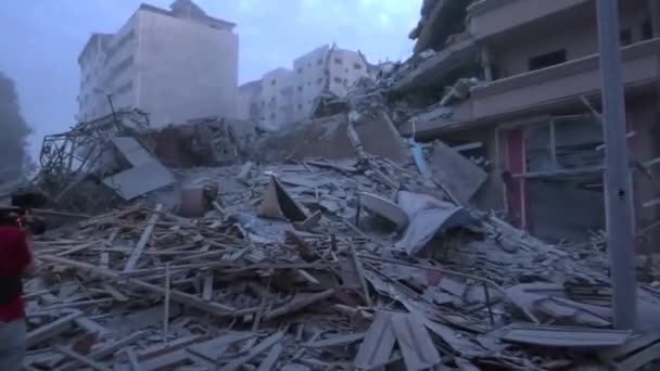 Последствия Разрушений Вызванных Израильскими Военными Самолетами Нанесли Удар Палестинской Башне — стоковое видео
