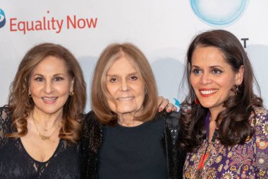 Equality Now Hosts Make Equality Reality Gala. October 11, 2023, New York, New York, USA: (L-R) Kathy Najimy, Gloria Steinem and Mona Sinha attend Equality Now Hosts Make Equality Reality Gala at Guastavino's clipart