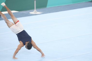 Sanatsal Jimnastik Bedava Eğitim Oturumu sırasında sporcular. 18 Ekim 2023, Santiago, Şili: Kolombiya, Jamaika, ABD, El Salvador, Porto Riko, Küba ve diğer ülkelerden sporcular erkekler serbest beden eğitimi eğitimine katıldılar