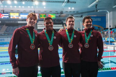 Santiago (Şili), 10 / 21 / 2023 - Brezilya altını, ABD gümüşü ve Kanada Bronzu ile yüzen erkekler 4x100 metre serbest yüzme finalinin finali, Şili 'deki Santiago Ulusal Stadyumu' nun su merkezinde gerçekleşti.