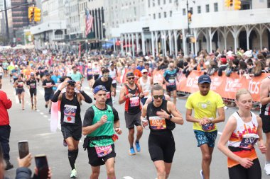 The 52nd New York City Marathon Race. November 5, 2023, New York, USA: The 52nd New York City Marathon Race started on Staten Island with roughly 55,000 athletes that traverse the 26.2-mile course through the citys five borough clipart