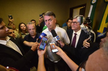 NATAL (RN), Brezilya 11 / 30 / 2023 - Eski Brezilya cumhurbaşkanı Jair Bolsonaro, bu Perşembe günü Natal Uluslararası Havaalanına indi, kentin bazı kesimlerini ziyaret etti ve destekçilerle bir araya geldi. 