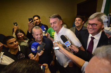 NATAL (RN), Brezilya 11 / 30 / 2023 - Eski Brezilya cumhurbaşkanı Jair Bolsonaro, bu Perşembe günü Natal Uluslararası Havaalanına indi, kentin bazı kesimlerini ziyaret etti ve destekçilerle bir araya geldi. 