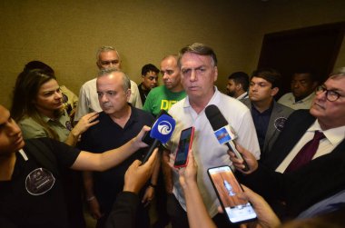 NATAL (RN), Brezilya 11 / 30 / 2023 - Eski Brezilya cumhurbaşkanı Jair Bolsonaro, bu Perşembe günü Natal Uluslararası Havaalanına indi, kentin bazı kesimlerini ziyaret etti ve destekçilerle bir araya geldi. 