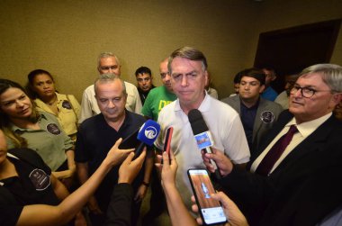 NATAL (RN), Brezilya 11 / 30 / 2023 - Eski Brezilya cumhurbaşkanı Jair Bolsonaro, bu Perşembe günü Natal Uluslararası Havaalanına indi, kentin bazı kesimlerini ziyaret etti ve destekçilerle bir araya geldi. 