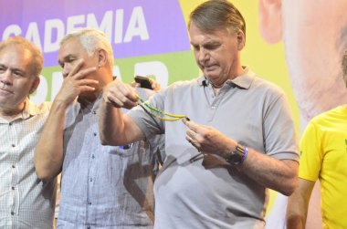 NATAL (RN), Brezilya 01 / 12 / 2023 - Brezilya 'nın eski başkanı Jair Bolsonaro, Centrais de Abastecimentos do RN S / A (CEASA _ RN)' da kahve içti, daha sonra Muhafazakar Akademi 'nin lansmanına katıldı ve günün sonunda 