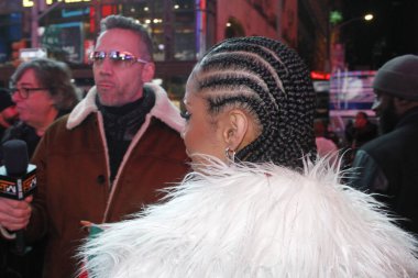 Tyla Performs at New Year's Eve at Times Square. December 31, 2023, New York, USA: Tyla Laura Seethal, known mononymously as Tyla, performs live at New Year's Eve at Times Square as fans scream and sing with her . 