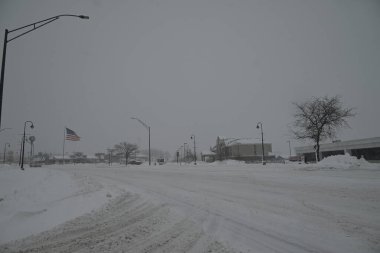 Tipi ABD 'nin Iowa eyaletinin Cedar Rapids, Iowa eyaletini etkiler. 12 Ocak 2024, Cedar Rapids, Iowa, ABD: Cedar Rapids, Iowa 'da tehlikeli koşullar bölge genelinde karayollarını etkilediği için, Cuma günü kar fırtınası uyarıları etkili oldu