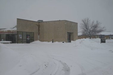 Tipi ABD 'nin Iowa eyaletinin Cedar Rapids, Iowa eyaletini etkiler. 12 Ocak 2024, Cedar Rapids, Iowa, ABD: Cedar Rapids, Iowa 'da tehlikeli koşullar bölge genelinde karayollarını etkilediği için, Cuma günü kar fırtınası uyarıları etkili oldu