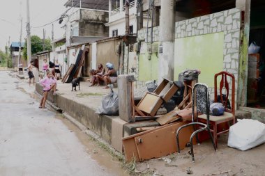 RIO DE JANEIRO (RJ), Brezilya 01 / 14 / 2024 - Rio de Janeiro 'nun Baixada Fluminense bölgesine düşen sağanak yağış çok hasara ve en az 11 ölüme yol açtı ve bugüne kadar bazı insanlar kayıp.
